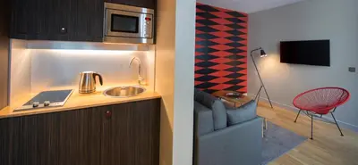 Cuisine ou kitchenette dans l'établissement Hôtel Helzear Champs-Elysées by Esteem