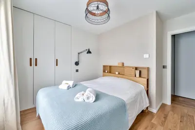 Un ou plusieurs lits dans un hébergement de l'établissement Splendid 3 bdrs Flat in a Prime Location of Paris