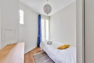 Un ou plusieurs lits dans un hébergement de l'établissement Splendid 3 bdrs Flat in a Prime Location of Paris