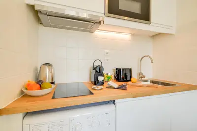 Cuisine ou kitchenette dans l'établissement Sweett - Saint Lazare