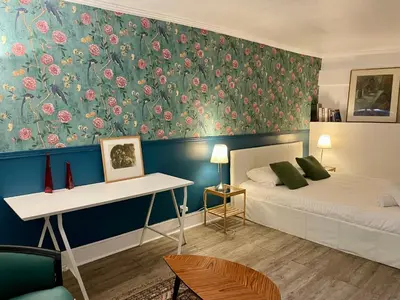 Un ou plusieurs lits dans un hébergement de l'établissement Elegant Triplex - Tour Eiffel Invalides