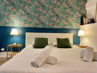 Un ou plusieurs lits dans un hébergement de l'établissement Elegant Triplex - Tour Eiffel Invalides
