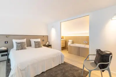 Un ou plusieurs lits dans un hébergement de l'établissement B1 Loft Duplex 175Blo-Paris Convention