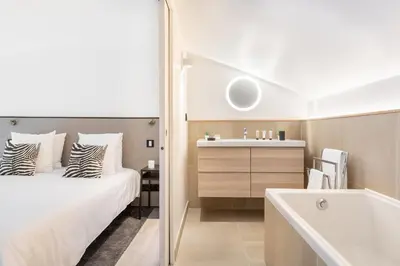 Un ou plusieurs lits dans un hébergement de l'établissement B1 Loft Duplex 175Blo-Paris Convention