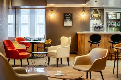 Coin salon dans l'établissement ibis Paris porte de Bercy