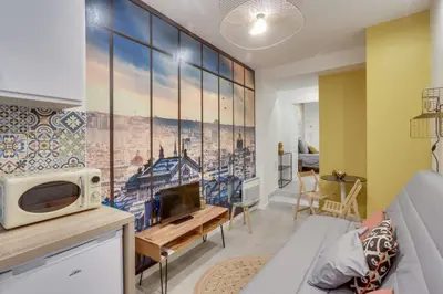 Coin salon dans l'établissement 143 Suite La Française Superbe Appartement à Paris