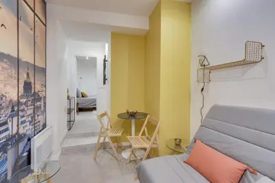Coin salon dans l'établissement 143 Suite La Française Superbe Appartement à Paris
