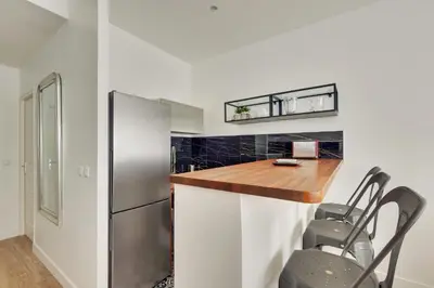 Cuisine ou kitchenette dans l'établissement Cocooning Apt St Germain - 4 pers
