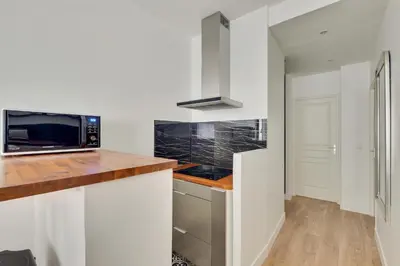 Cuisine ou kitchenette dans l'établissement Cocooning Apt St Germain - 4 pers