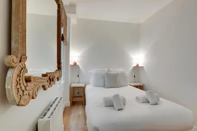 Un ou plusieurs lits dans un hébergement de l'établissement Cocooning Apt St Germain - 4 pers
