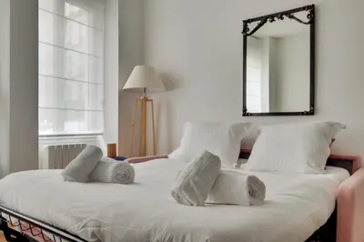 Un ou plusieurs lits dans un hébergement de l'établissement Cocooning Apt St Germain - 4 pers