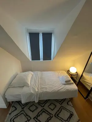Un ou plusieurs lits dans un hébergement de l'établissement Canal Saint Martin apartments