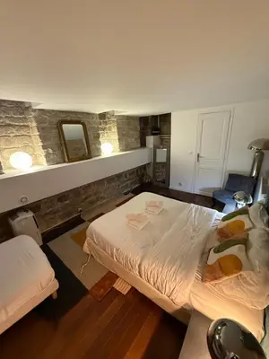 Un ou plusieurs lits dans un hébergement de l'établissement Canal Saint Martin apartments