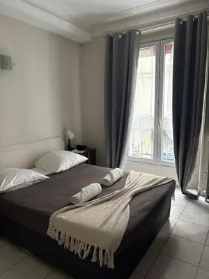Un ou plusieurs lits dans un hébergement de l'établissement HOTEL DU MONT LOUIS