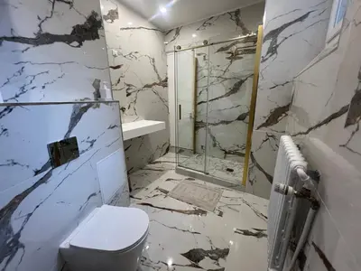 Salle de bains dans l'établissement BASSANO