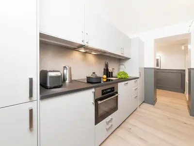Cuisine ou kitchenette dans l'établissement LivinParis - Luxury AC 3 Bedrooms Le Louvre III