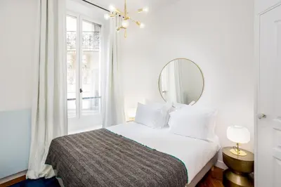 Un ou plusieurs lits dans un hébergement de l'établissement Habitat Parisien - 1BR-1BA - Bourse Montorgueil