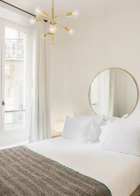 Un ou plusieurs lits dans un hébergement de l'établissement Habitat Parisien - 1BR-1BA - Bourse Montorgueil