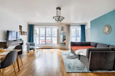 Coin salon dans l'établissement NEW Paradis - 2Bdrs Flat in the Heart of Paris