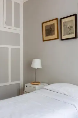 Un ou plusieurs lits dans un hébergement de l'établissement Veeve - Muted Beauty in Batignolles