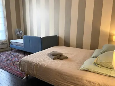 Un ou plusieurs lits dans un hébergement de l'établissement Outstanding 2 bedrooms with a terrific Eiffel Tower view