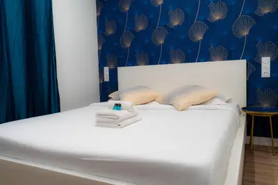 Un ou plusieurs lits dans un hébergement de l'établissement Rent a Room - Cosy 1BDR