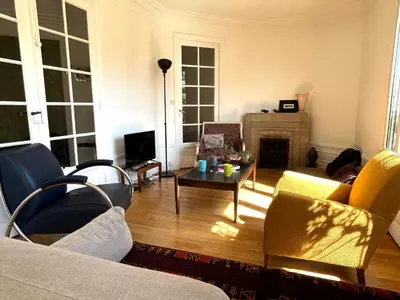 Coin salon dans l'établissement Le Penthouse Guy Moquet