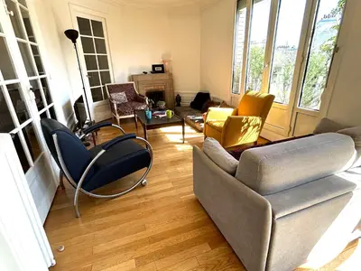 Coin salon dans l'établissement Le Penthouse Guy Moquet