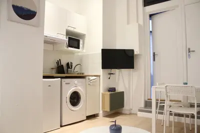 Cuisine ou kitchenette dans l'établissement Atypical Apartment - Jardin Des Plantes