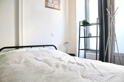 Un ou plusieurs lits dans un hébergement de l'établissement Atypical Apartment - Jardin Des Plantes