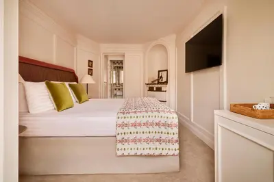 Un ou plusieurs lits dans un hébergement de l'établissement Hotel Maison Monceau