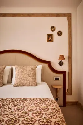 Un ou plusieurs lits dans un hébergement de l'établissement Hotel Maison Monceau