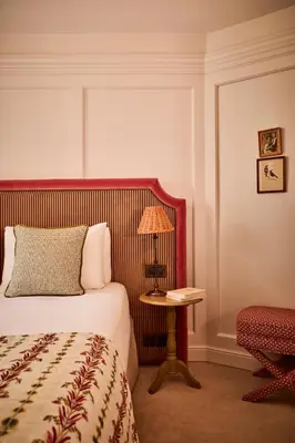 Un ou plusieurs lits dans un hébergement de l'établissement Hotel Maison Monceau