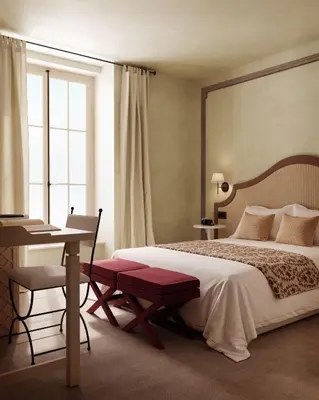Un ou plusieurs lits dans un hébergement de l'établissement Hotel Maison Monceau