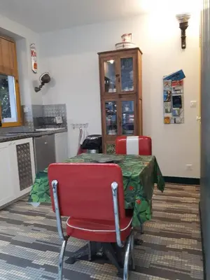 Cuisine ou kitchenette dans l'établissement Le nichoir aux oiseaux