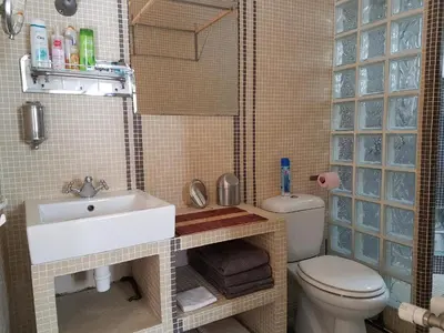 Salle de bains dans l'établissement Le nichoir aux oiseaux