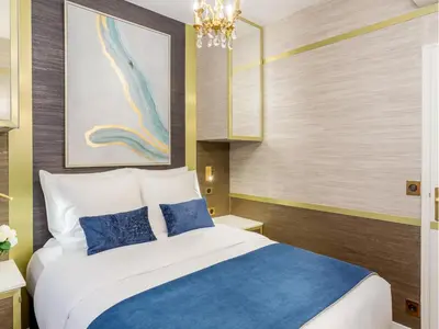 Un ou plusieurs lits dans un hébergement de l'établissement Merveil - Luxury Suite - Tour Eiffel - Laos