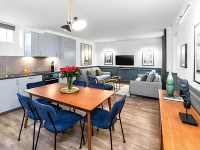 Télévision ou salle de divertissement dans l'établissement LivinParis - Luxury 2 Bedrooms Opera VI