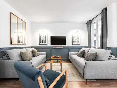 Télévision ou salle de divertissement dans l'établissement LivinParis - Luxury 2 Bedrooms Opera VI
