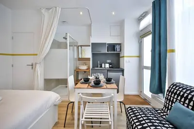 Un ou plusieurs lits dans un hébergement de l'établissement cosy independant studio proche gare et jardin