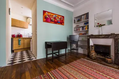 Télévision ou salle de divertissement dans l'établissement Studio I love Montmartre