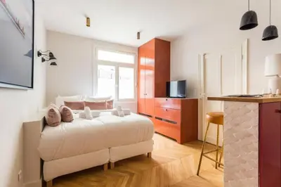 Un ou plusieurs lits dans un hébergement de l'établissement Appartement Studio Trocadéro