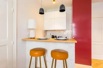 Cuisine ou kitchenette dans l'établissement Appartement Studio Trocadéro
