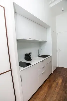 Cuisine ou kitchenette dans l'établissement Appt calme et central proche Arc de Triomphe