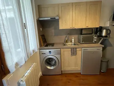 Cuisine ou kitchenette dans l'établissement Studio Saint-Placide