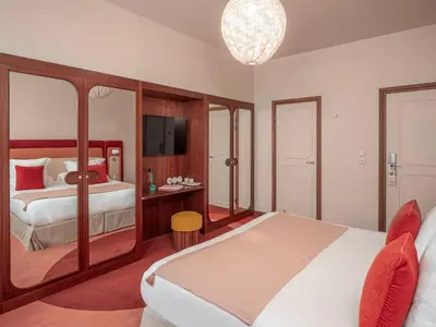 Un ou plusieurs lits dans un hébergement de l'établissement Hôtel Saint-André des Arts