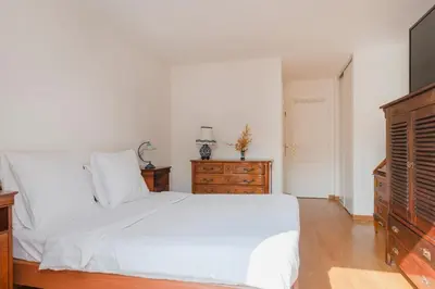 Un ou plusieurs lits dans un hébergement de l'établissement Beaudelaire Center Residence