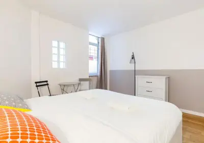 Un ou plusieurs lits dans un hébergement de l'établissement Atelier d Artiste Le Marais Paris - exceptionnel !