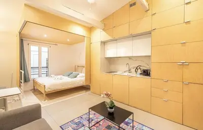 Un ou plusieurs lits dans un hébergement de l'établissement GuestReady - Modern Studio 1min Charonne Metro
