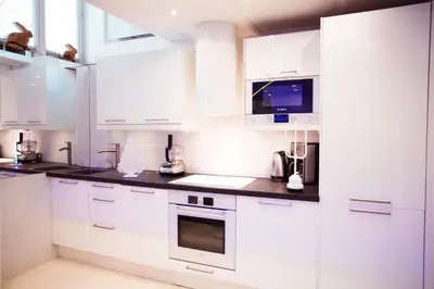 Cuisine ou kitchenette dans l'établissement Stylish,luxury duplex Paris city center